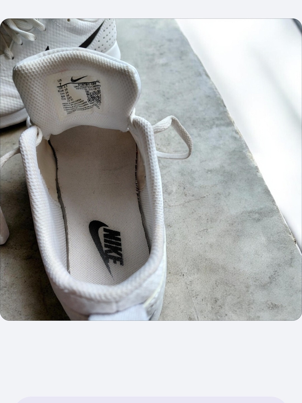 Nike White Sneakers with Black Swoosh Accent - Picture 3 of 3